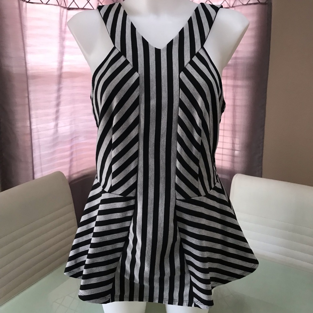 Torrid peplum sleeveless top